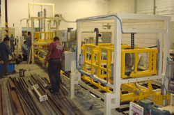 Metal fabrication workshop with welding equipment and steel structures