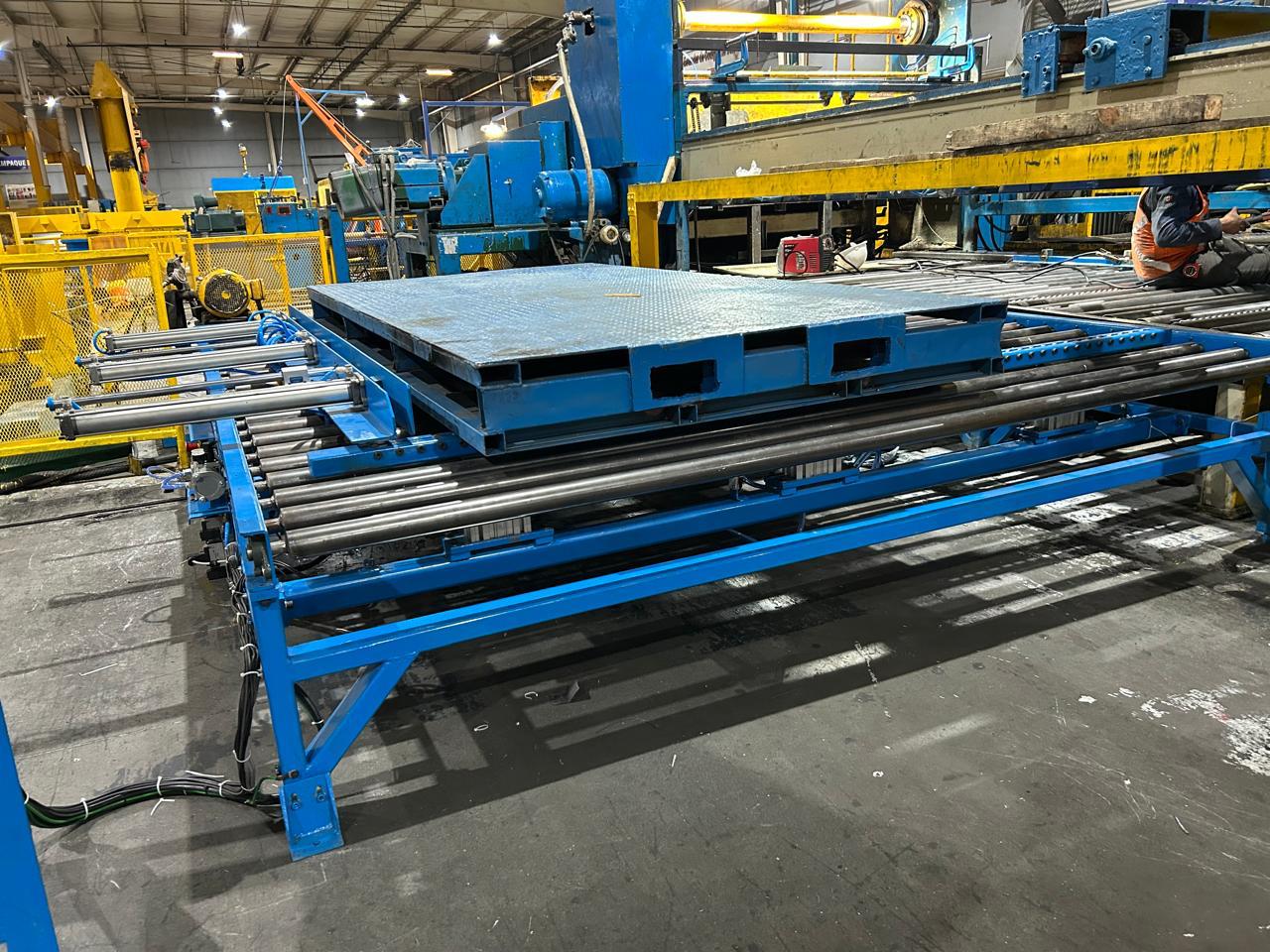 Automated material handling system with conveyor belts in modern warehouse